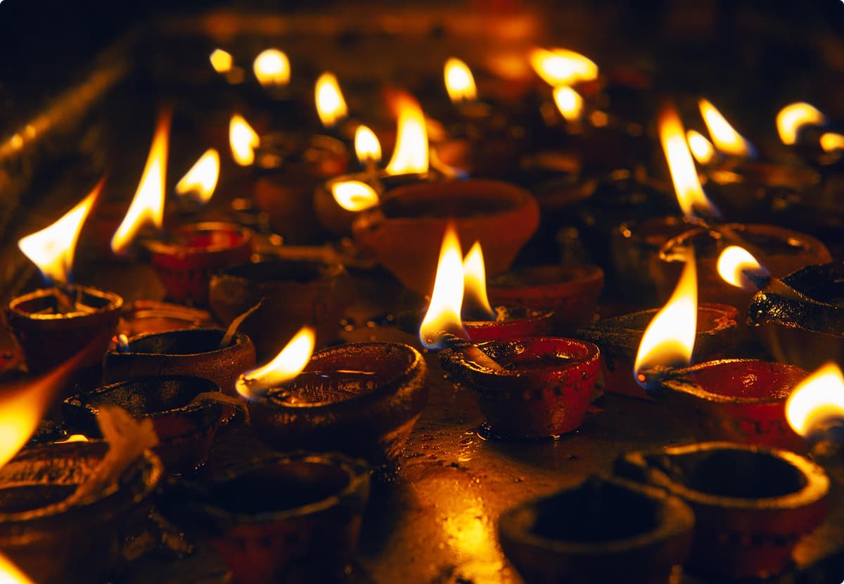 Sacred deepam lamps glowing in the temple
